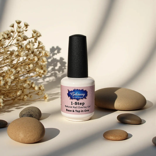 1-Step Gel .6oz bottle with natural stones and dried flowers in soft natural light for gel nail systems